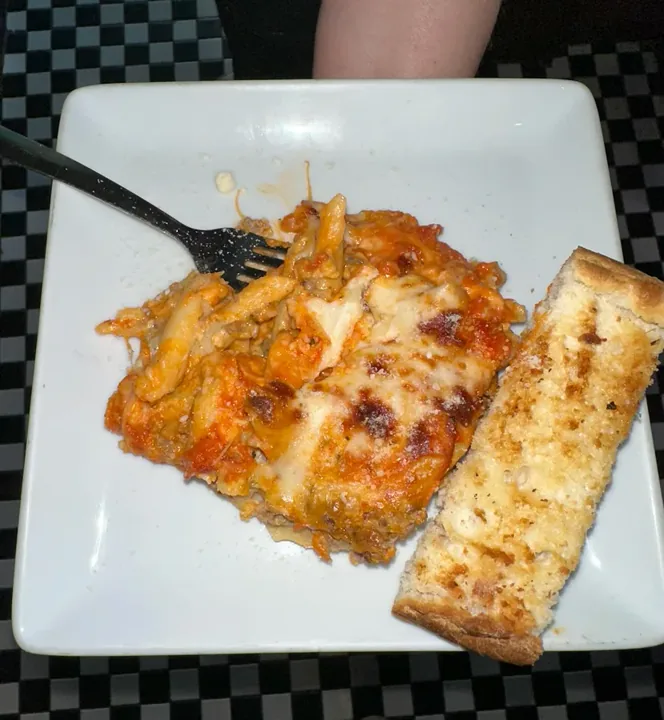 Lasagna casserole with garlic bread